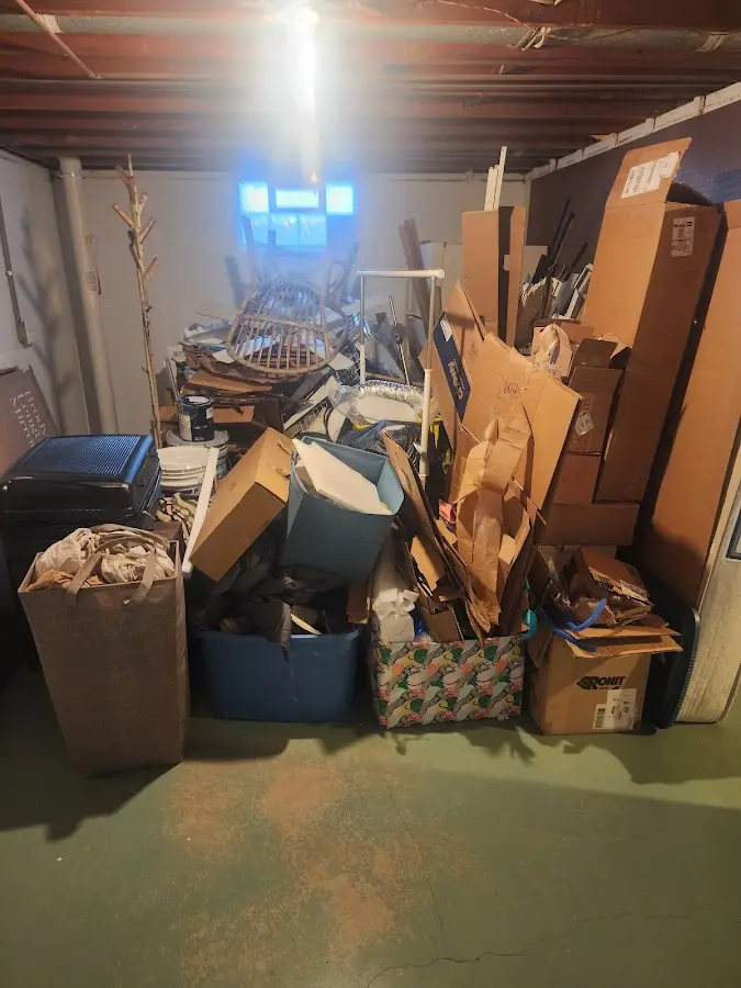 Roll-off dumpster container at job site for 4 Yard Dumpster Rental in Adel